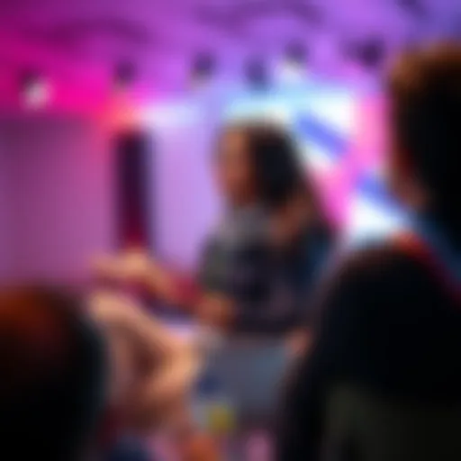 Asha Sharma discusses exclusive content strategy on stage at a conference with an engaged audience