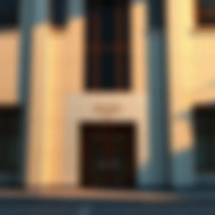 A modern building facade with no visible entrance or door, showcasing blank walls and large windows