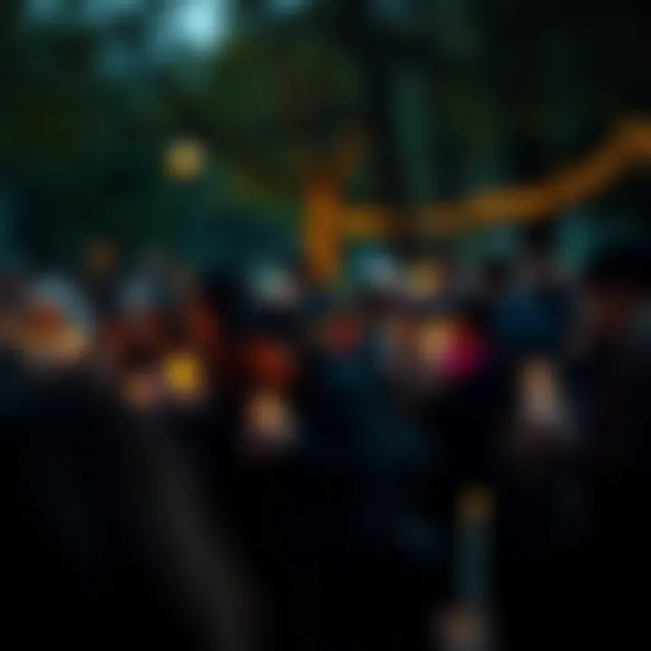 People holding candles in remembrance A group of people gathered in a park, holding candles during a vigil to honor lost loved ones, showing solidarity in their grief.