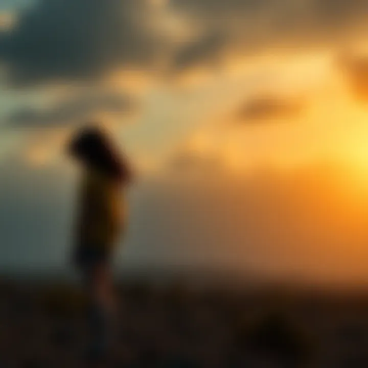 Clementine standing alone, looking contemplative in a somber landscape, symbolizing her journey after Lee's death.