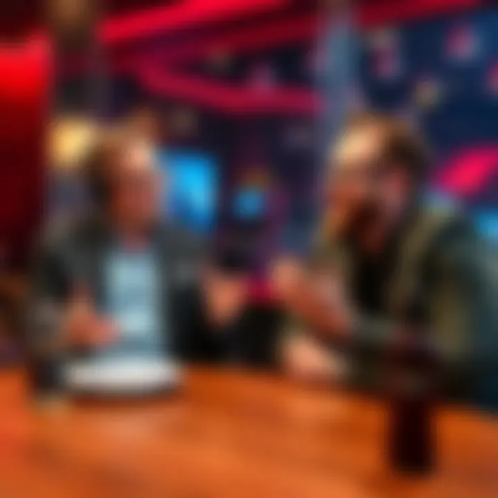 Conan O'Brien and Bill Hader joking about the God of War story at a table