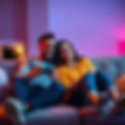 A couple sitting on a couch, smiling and playing video games together with a game controller in hand