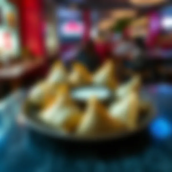 A plate filled with crispy cream cheese rangoons served with dipping sauce, surrounded by casual eating atmosphere.