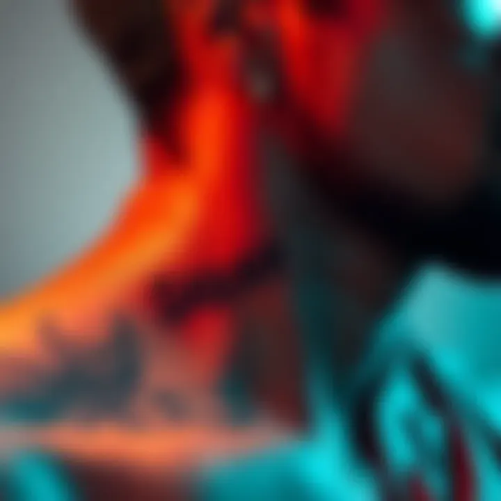 Close-up of Deek's neck showing the tattoo that reads 'SARAH FOREVER', with a thoughtful expression on his face.