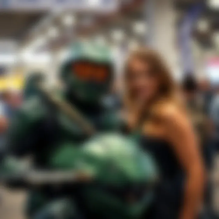 A fan in a Halo Infinite pilot costume poses with voice actors Steve Downes and Jen Taylor at Comic Palooza.