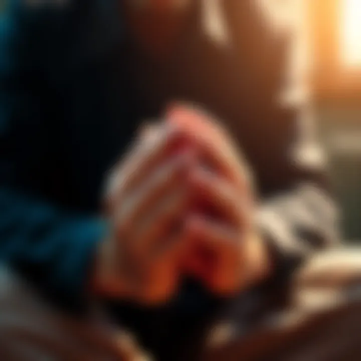 Hands clasped in prayer A person sitting calmly with hands clasped in prayer, expressing hope and faith during a challenging time.