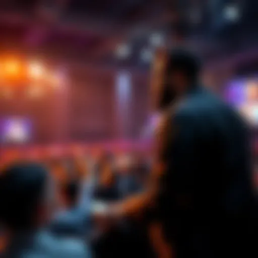Hasan speaking on stage with a concerned audience at a Black subscriber event