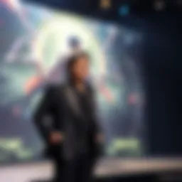 Hideo Kojima stands on stage, excitedly announcing the lead actor for his new game PHYSINT, with a backdrop of game artwork.