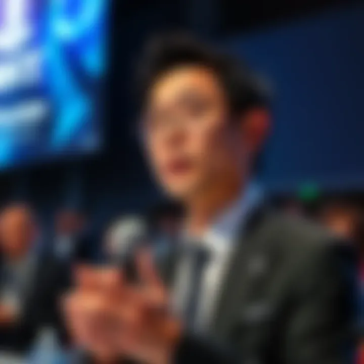 Hiroki Totoki speaking at a press event about Sony's gaming revenue and PlayStation's role in the gaming industry