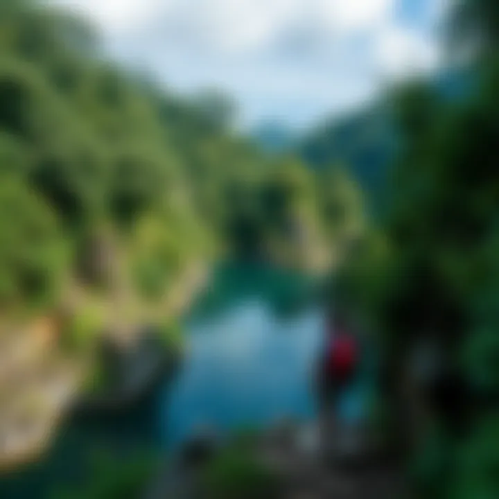 A hiker facing steep terrain on Ika Island, surrounded by lush green trees and rocky paths.