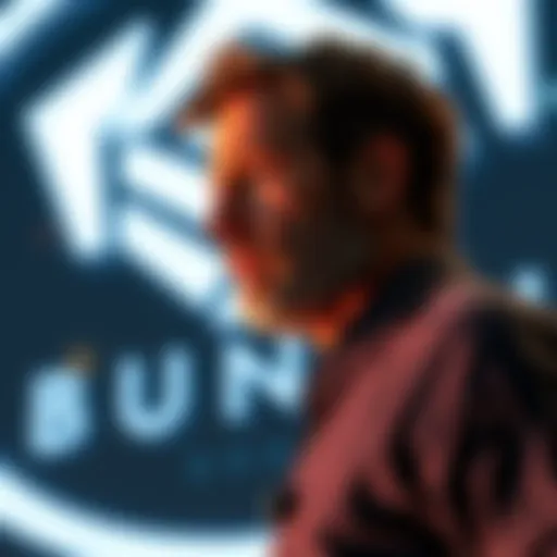 Jason Jones, co-founder of Bungie, looks contemplative in front of a Bungie logo as he leaves the company