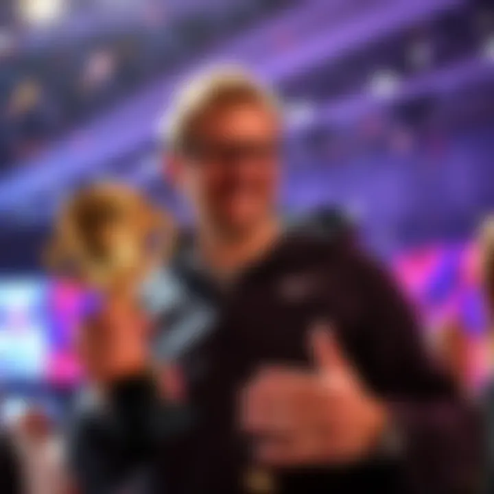 Kevin K. smiles and holds a trophy after winning the weekly 10K drawing