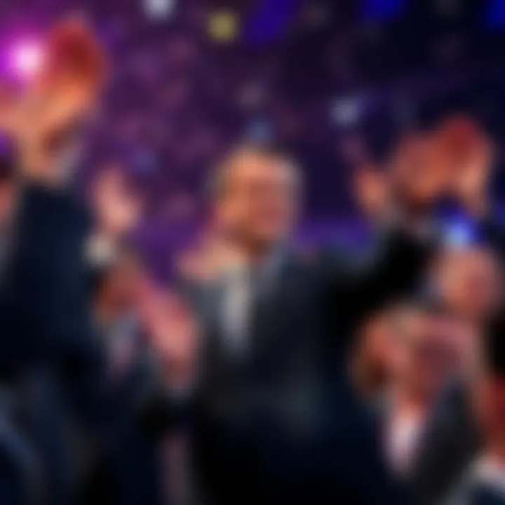 French President Emmanuel Macron applauds the winners of the Paris Major during a celebratory event.