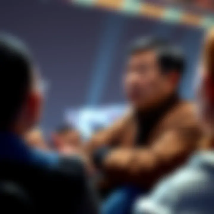 Shigeru Miyamoto discussing gaming Shigeru Miyamoto speaking about Nintendo's future beyond consoles, with people listening attentively