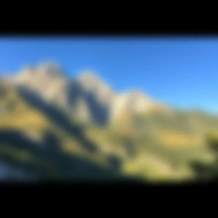 A panoramic view of Mount Olympus showcasing its diverse sections with greenery and rocky peaks under a clear sky.