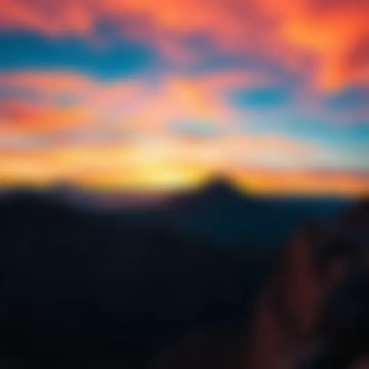 A vibrant shot of a sunset over a mountain range with colorful skies