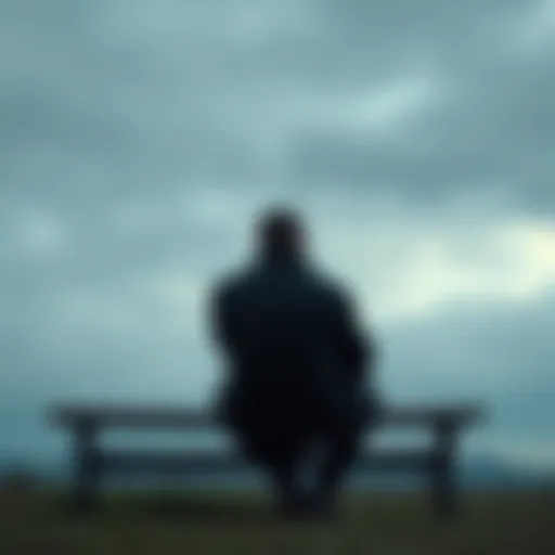 A person sitting on a bench under a gray sky, looking thoughtful and contemplative, symbolizing sadness and emotional struggles.