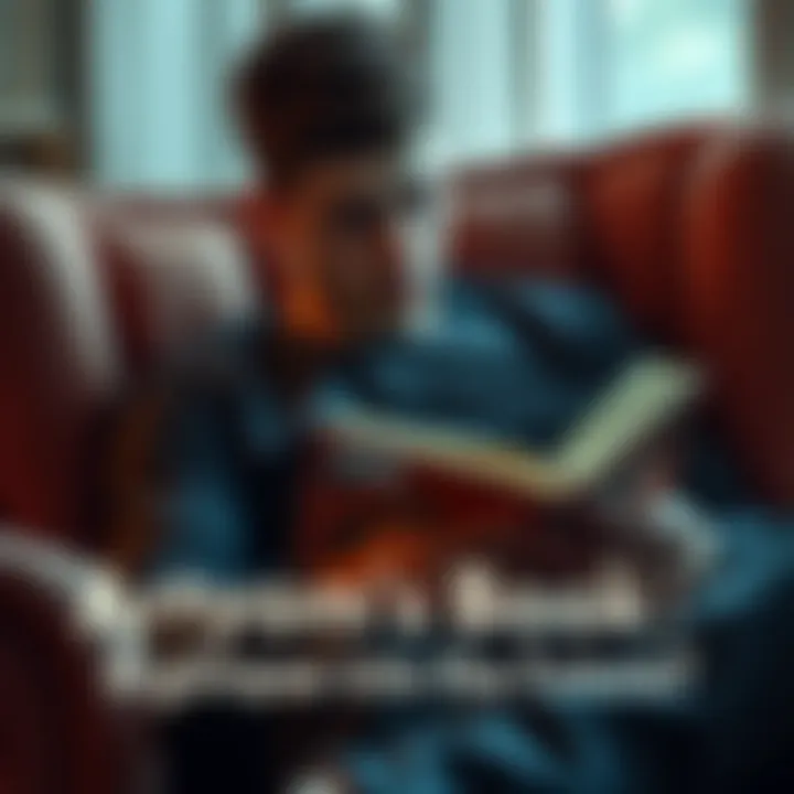 A young man sits in a cozy chair, deeply focused on a book, suggesting a moment of insight or contemplation