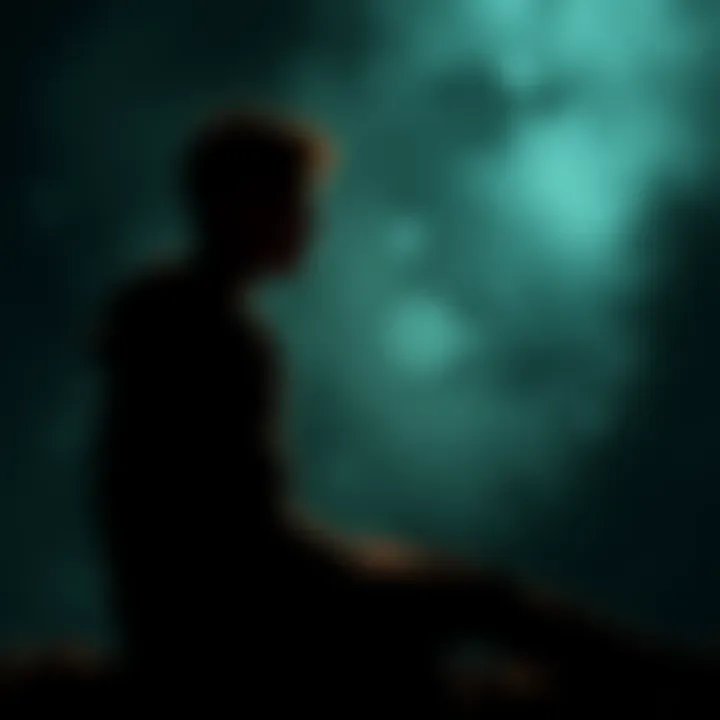 A person sitting alone, lost in thought, depicting the struggle with inner hate and heavy emotions.