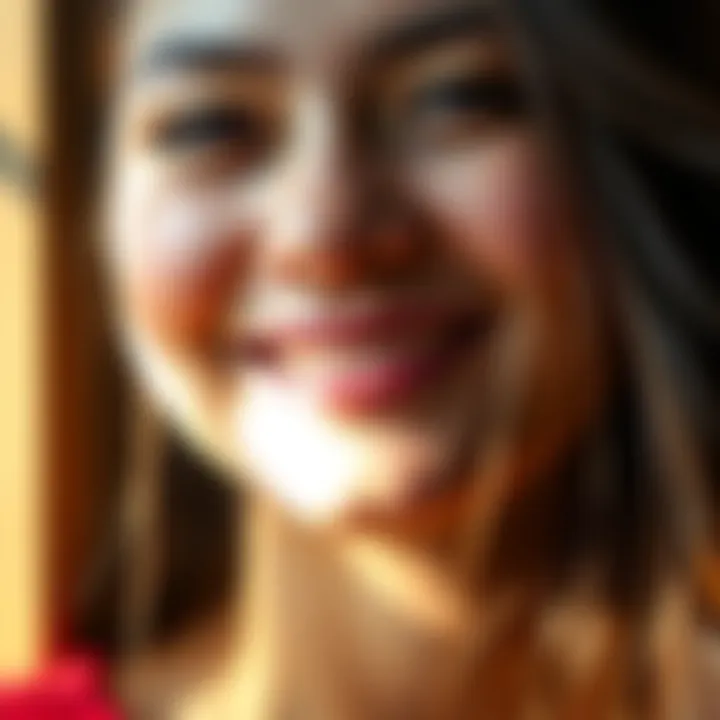 A person smiling softly A close-up of a person with a warm smile, showcasing simplicity and depth in expression.