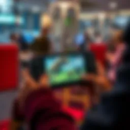 A person playing a Monster Hunter game on a handheld console during a break at work