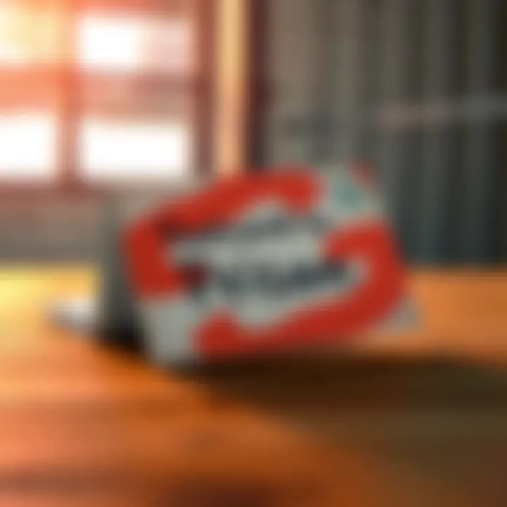 A postcard with a bright illustration rests on a wooden table, symbolizing hope and connection to a prisoner.