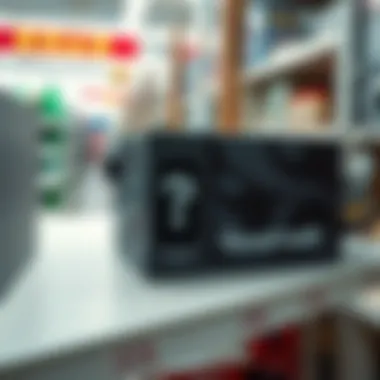 A close-up of an $8 power supply unit with a questionable logo found at Goodwill, placed on a thrift store shelf.