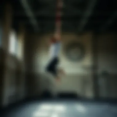 Practitioner Performing Wall Jump Aerial practitioner executing a wall jump with clear technique in a gym setting