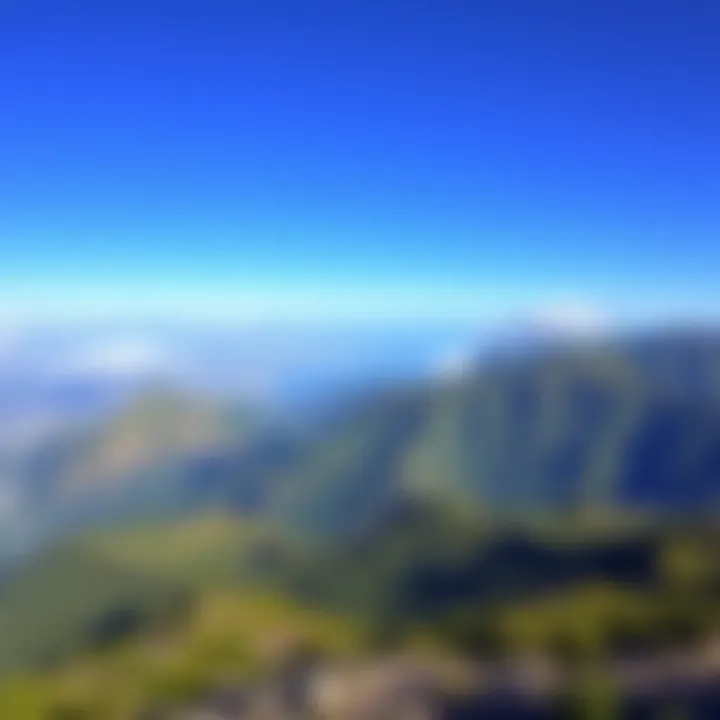 A breathtaking landscape of Cairn, showcasing green hills and clear blue skies, perfect for outdoor activities.