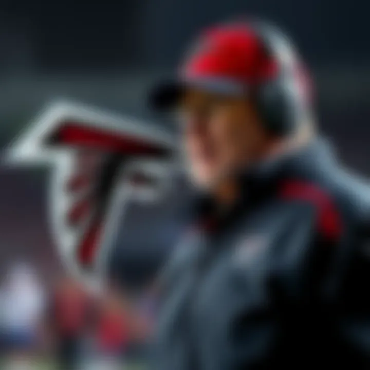 Spammiej in coaching gear alongside the Falcons logo