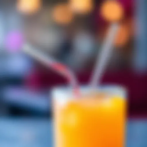 Straw in a drink A clear straw inserted into a glass of colorful juice, demonstrating how it works to sip the liquid.