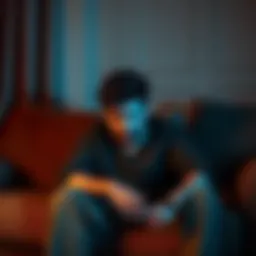 A person sitting on a couch looking stressed and thoughtful during weed withdrawal, with signs of discomfort visible