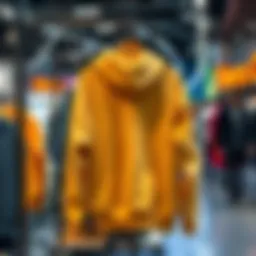 A trendy hoodie displayed on a rack, attracting people's attention