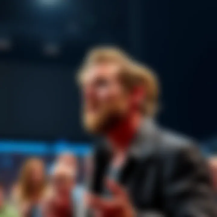 Troy Baker, a well-known voice actor, speaking to a crowd at a public event, showing mixed reactions from fans in the background